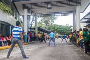 Instead of playing in the streets, participants of Patintero play in front of the St. Flavius Hall.