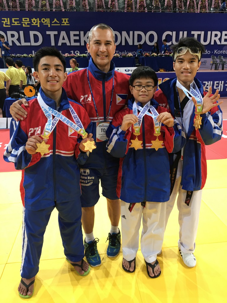 (L-R) Coby Calupitan, DLSZ Taekwondo Coach Ricky Santiago, Joaquin Marte, and Lance Ortillo