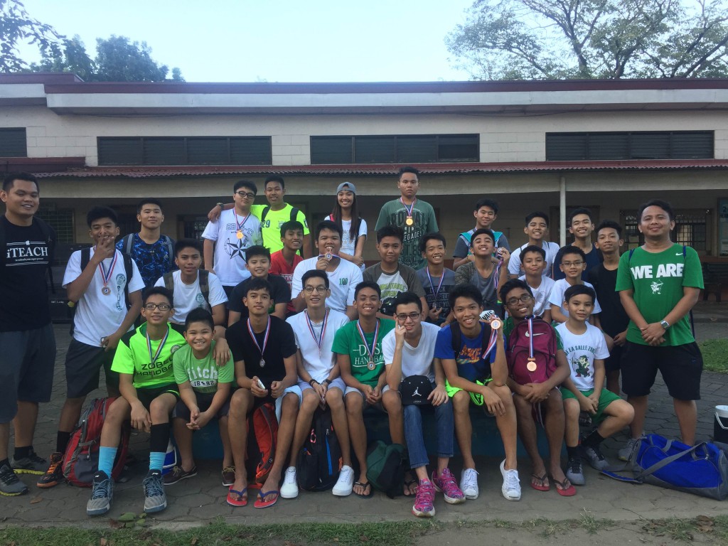 The DLSZ Handball Team together with Mr. Marvin Veluz and Mr. Freedom Andres after their game in Ateneo De Manila University.