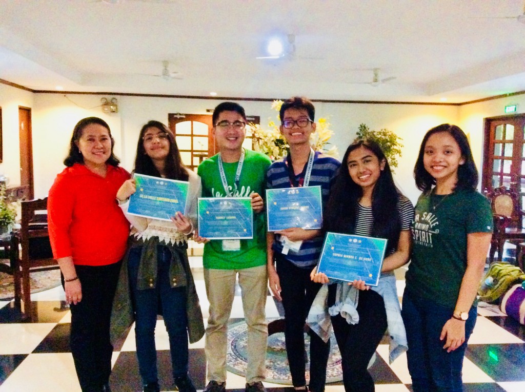 (L-R) A DLSP LYES organizer, Kirsten Caroline Reyes, Mr. Rodney Labaro, Joshua Mikael Quijano, Sophia Bianca De Vera and another DLSP LYES organizer.